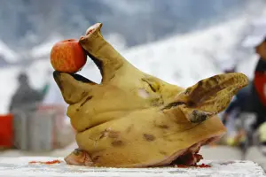 The head of a slaughtered pig is seen during the annual pork festival in Balvanyos