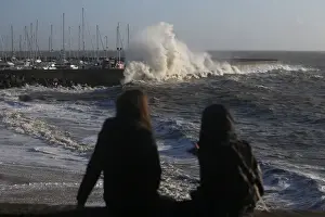 Weather Prints: A high wave crashes on the protecting wall at the fishing harbour in Pornic