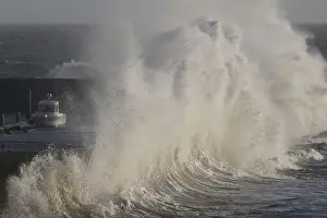Weather Prints: A high wave crashes on the protecting wall at the fishing harbour in Pornic