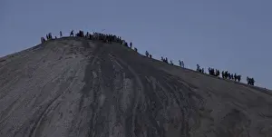 Hindu devotees climb towards the crater of the Chandargup mud volcano in Pakistan s