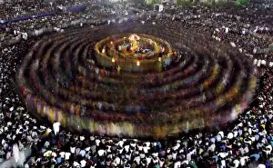 Hindu devotees perform Garba, a traditional folk dance, during the celebrations to