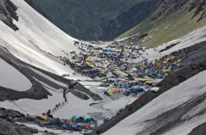 India Prints: Hindu pilgrims arrive to worship at the holy cave of Lord Shiva in Amarnath