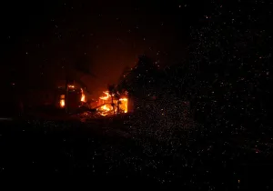 California Prints: Home burns during a wildfire that claimed dozens of others in Thousand Oaks