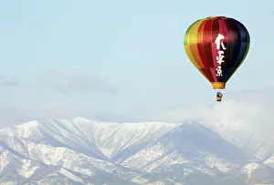 Japan Prints: A hot air balloon flies over Obihiro, northern Japan