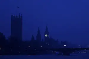United Kingdom Prints: The Houses of Parliament are seen in early morning mist in central London