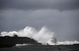 Weather Prints: Huge waves crash onto San Esteban de Pravia seafront in the northern Spanish region