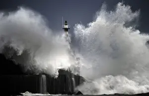 Environment Prints: Huge waves crash on the San Esteban de Pravia seafront in the northern Spanish region of