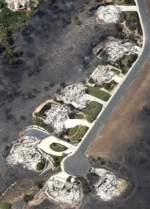 Wildfire Prints: Some of the hundreds of totally destroyed homes are seen from the air in the aftermath of