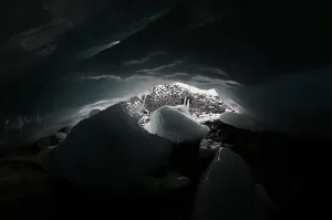 Climate Prints: An ice cave at the leading edge of the Pastoruri glacier is seen in Huaraz
