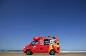 An ice cream vendor waits for business on Portstewart Strand beach