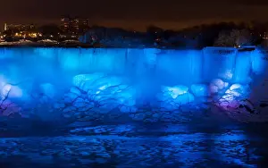 Ice and water flow over the American Falls, viewed from the Canadian side in Niagara