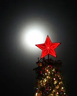 Illuminated red star sits atop Christmas tree in southern Russian city of Stavropol
