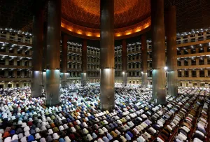Indonesian Muslims pray at the first day of holy fasting month of Ramadan at Istiqlal