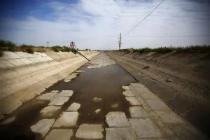 Climate Prints: An irrigation canal is seen near the dried up Shiyang river on the outskirts of Minqin