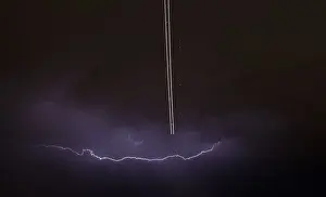 Weather Prints: Jet aircraft takes off as lightning strikes across the sky during a monsoon storm
