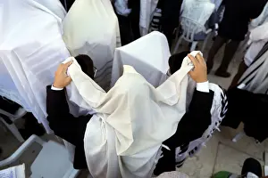 Passover Prints: Jewish worshippers wrapped in prayer shawls participate in the priestly blessing prayer