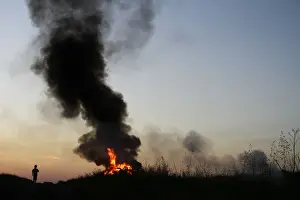 Kosovo Serbs set a bonfire to celebrate the eve of First May Day or Labour Day in their