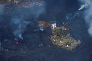 Hawaii Prints: Lava encircles several homes in the Leilani Estates near Pahoa, Hawaii