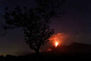 Guatemala Prints: Lava flows from Fuego volcano during an eruption as seen from Alotenango