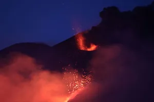 Italy Prints: Lava and plumes of smoke erupt from Mount Etna