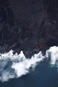 Hawaii Prints: Lava pours into the ocean after crossing Highway 137 near Kapoho, Hawaii