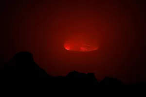 Lava is seen glowing inside the crater of the Nyiragongo volcano inside the Virunga Lava is seen glowing inside the crater of the Nyiragongo volcano inside the Virunga