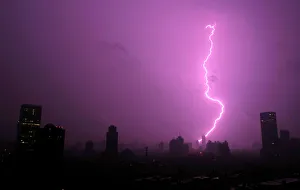 Prints of A lightning bolt strikes during a thunderstorm over Shanghai, China July 6, 2005 China Prints: A lightning bolt strikes during a thunderstorm over Shanghai