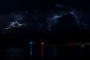 Malta Prints: A lightning storm is seen beyond the entrance to Vallettas Grand Harbour