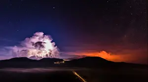 Landscapes Prints: A long time exposure shows molten lava which flows from the Piton de la Fournaise
