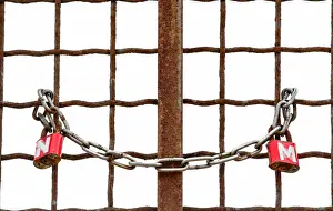 Love locks are seen attached to a metal fence near the canal of Port Said
