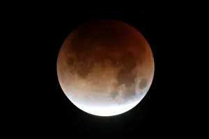 A lunar eclipse of a full Blue Moon is seen in Santa Monica