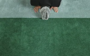 Prints of A man prays at the Baitul Futuh Mosque in London February 18, 2011. According to the mosque, it is the largest mosque in western Europe Britain Prints: A man prays at the Baitul Futuh Mosque in London