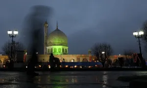 A man walks in front of Kashmir's holiest shrine Hazratbal A man walks in front of Kashmir's holiest shrine Hazratbal