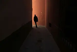 A man walks through the Santa Cruz neighbourhood in the Andalusian capital of Seville
