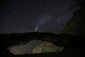Jordan Prints: A man watches the stars seen on the sky of Al-Kharza area in Wadi Rum in the south of