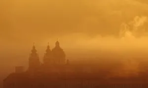 Austria Prints: Melk Abbey is pictured through mist in the morning sun in Melk