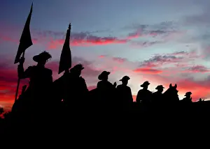 Members of the Australian Lighthorse Association watch over an Anzac Day dawn service at Bogan