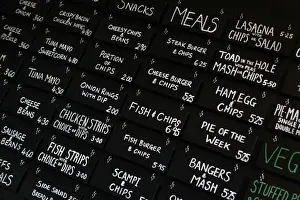 The menu board is seen inside the Little Driver pub in east London