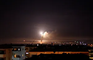 Mideast Prints: Missile fire is seen from Damascus