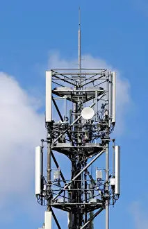 Images Dated 19th June 2018: Mobile telecom transmitter relays and antenna are seen on the roof of a building in