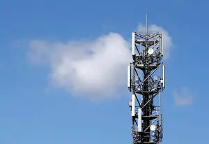 Images Dated 19th June 2018: Mobile telecom transmitter relays and antenna are seen on the roof of a building in
