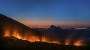 Reunion Prints: Molten lava erupts from the Piton de la Fournaise, one of the worlds most active