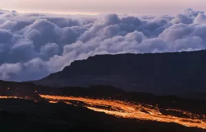 Reunion Prints: Molten lava flows from the Piton de la Fournaise, one of the worlds most active