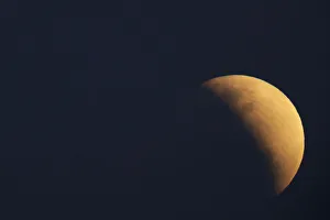 Lunar Prints: A moon is seen during a partial lunar eclipse in Brasilia