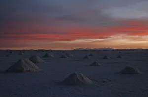 Mounds of salt formed by miners sit on the Salar de Uyuni, the worlds biggest salt desert