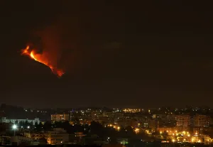 Italy Prints: Mount Etna spews lava on the southern Italian island of Sicily