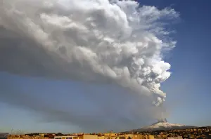 Italy Prints: Mount Etna spews volcanic ash during an eruption on the southern Italian island of Sicily