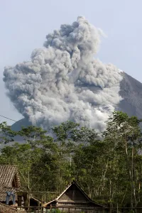 Indonesia Prints: Mount Merapi spews pyroclastic smoke as seen from Balerante village in Klaten