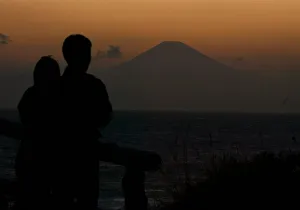 MT FUJI LOOMS IN EVENING GLOW IN YOKOSUKA MT FUJI LOOMS IN EVENING GLOW IN YOKOSUKA