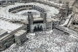 Haj Prints: Muslim pilgrims walk out after the Friday prayer at the Grand mosque ahead of annual Haj